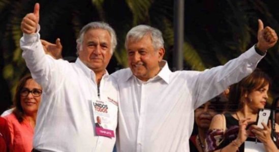 Miguel Torruco and AMLO celebrating thier victory.